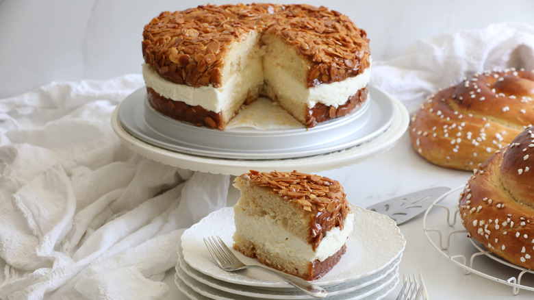 Bienenstich with one slice on plate ready to be served