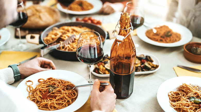 A group eating an Italian meal