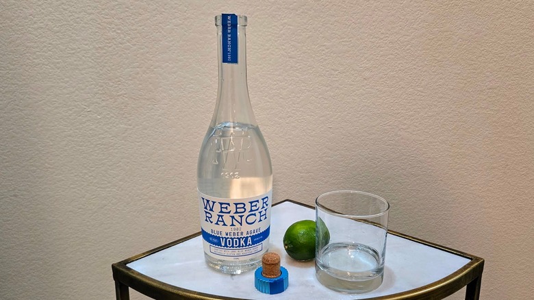 Weber Ranch 1092 bottle, glass and lime