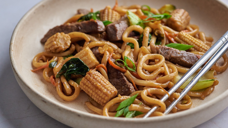 beef stir-fry with chopsticks