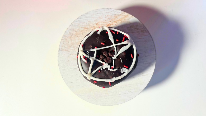 Voodoo Doughnut Diablos Rex donut on white table