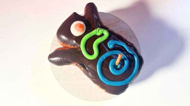 Voodoo Doughnut Voodoo Doll donut on white table