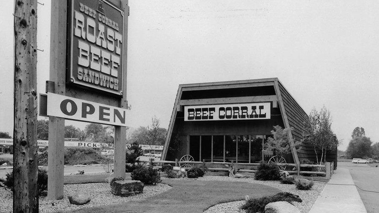 black and white photo of the outside of a Beef Corral restaurant in the 1970s