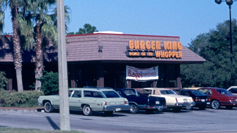 Burger King branch in the 1970s with 1970s cars parked outside