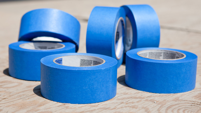 Several rolls of blue painter's tape