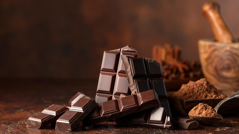 Various chocolate bars and bite-sized candies in a pile