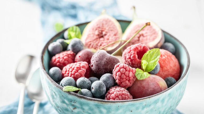 Bowl of various frozen fruits