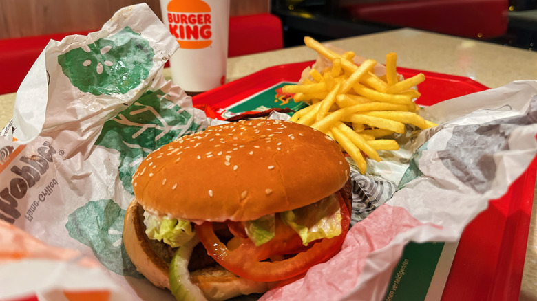 Burger King Whopper and fries on fast food tray