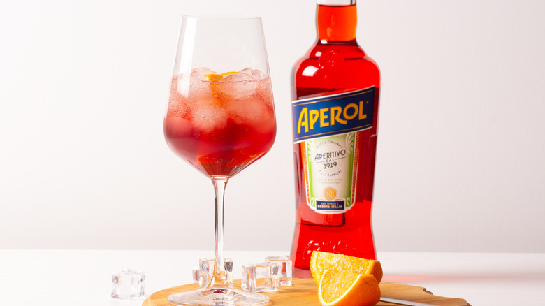 Bottle of Aperol with glass