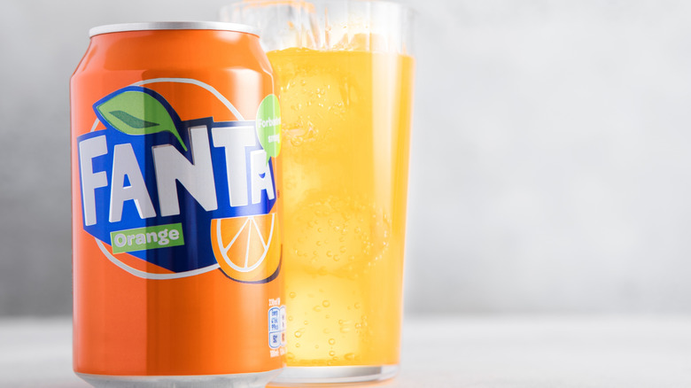 A can and glass of Fanta