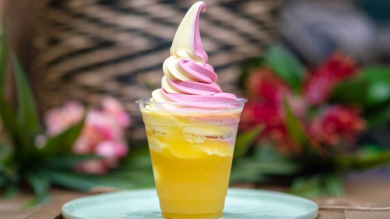 Dole Whip swirl float on a light blue plate at Disneyland