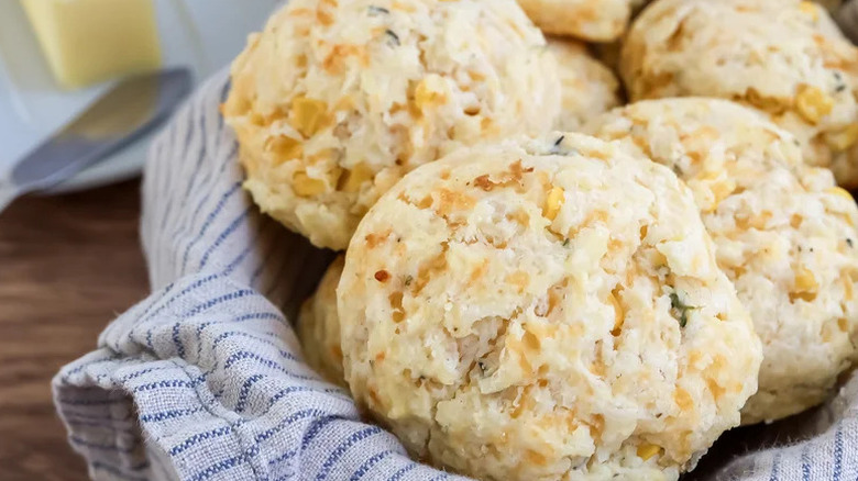 Buttermilk Sweet Corn Biscuits in towel-lined basket