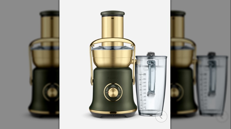 A green and gold Breville Juice Fountain