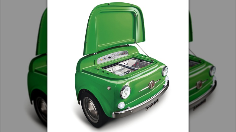 A green car-shaped refrigerator for drinks