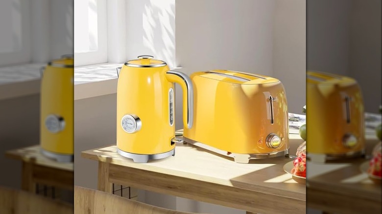 A matching yellow SUSTEAS kettle and toaster