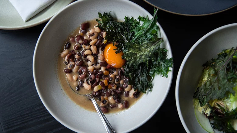 Aerial shot of black-eyed peas and crispy collard greens