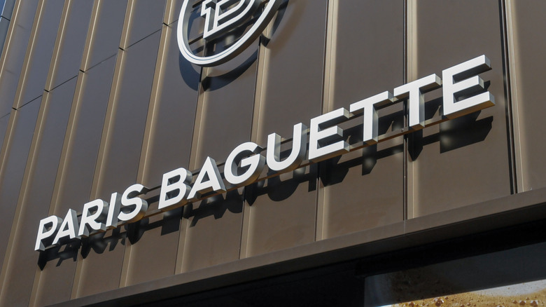 Paris Baguette sign on brown building