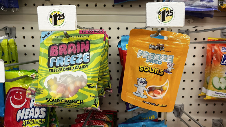 Bags of colorful freeze-dried candies displayed on a shelf