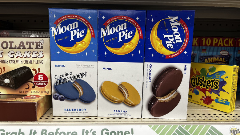 Boxes of Moon Pies in different flavors stacked on a shelf