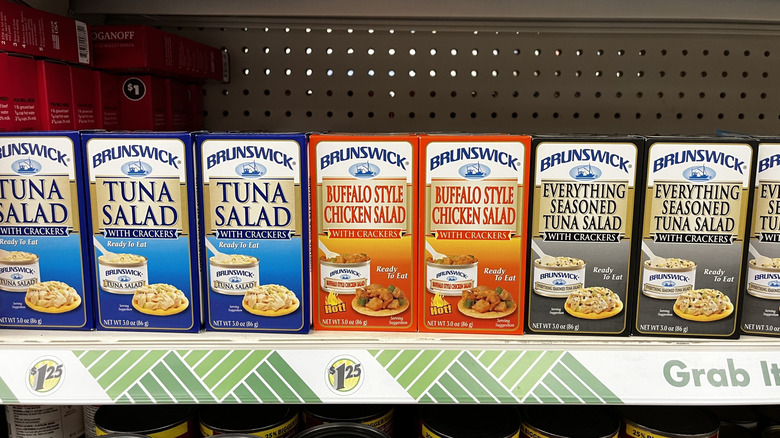 Snack-size packs of tuna or chicken salad with crackers displayed together