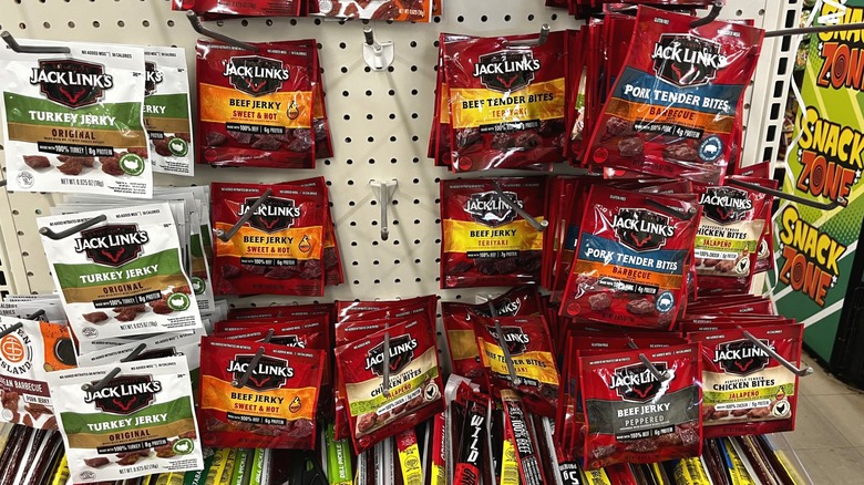 Various meat jerky items hang up