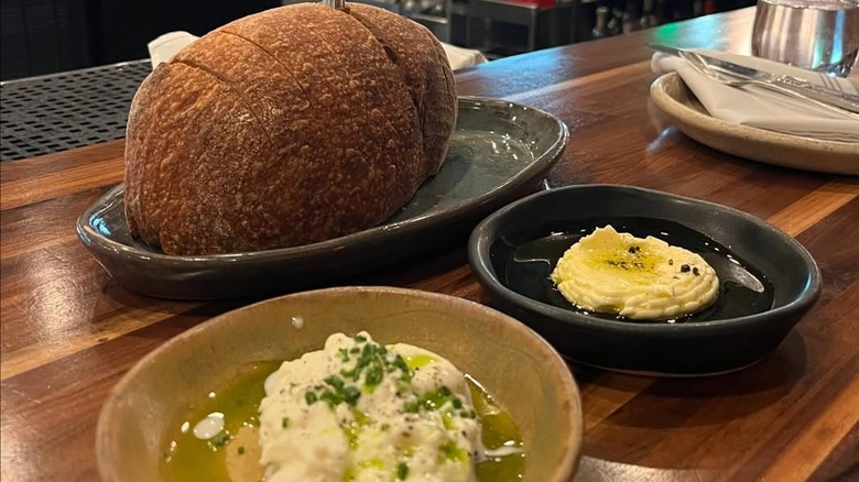 Homemade sourdough with accompaniments at Esther's Kitchen
