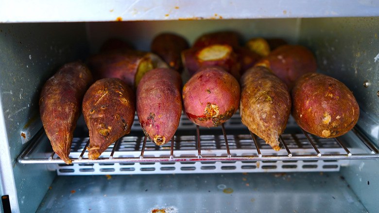 Whole sweet potatoes in a convection oven