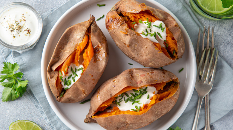 Three twice-baked sweet potatoes on plate