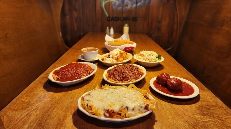 Spaghetti plates on wooden table
