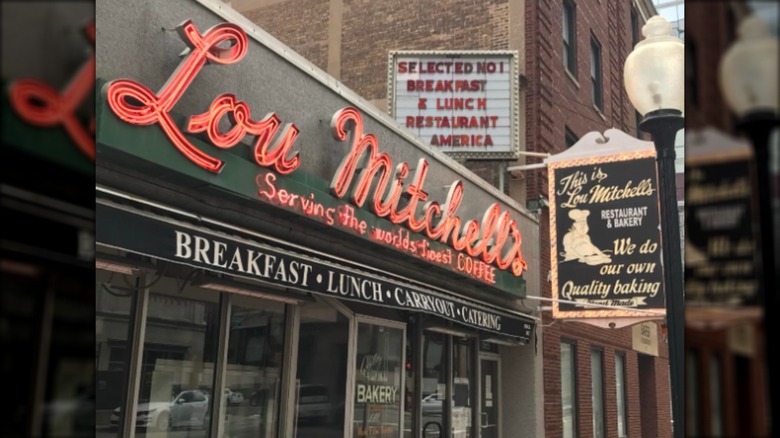 Exterior of Lou mitchell's with signs