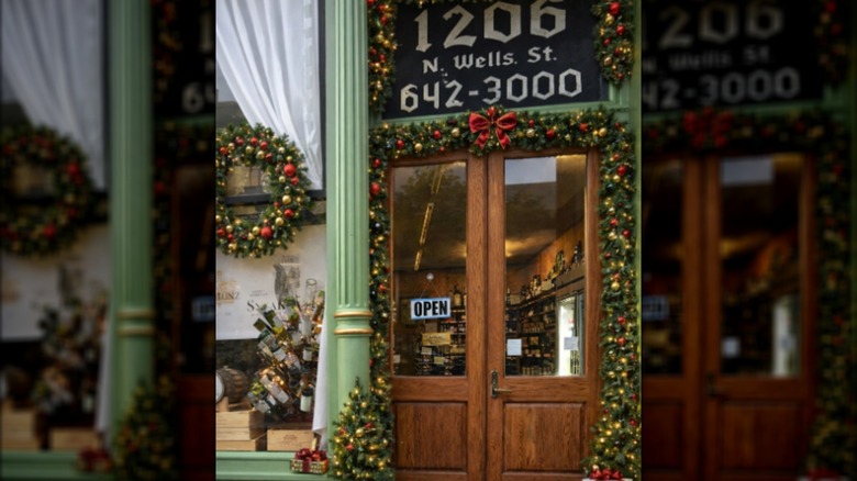 Front door o the Glunz Tavern decorated with holly and ornaments