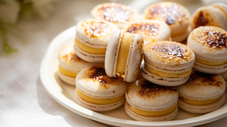 Creme-brulee macarons on plate