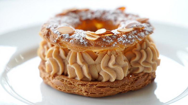 Paris-Brest pastry on white plate