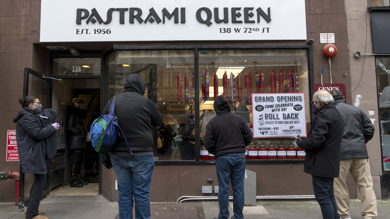 People waiting outside Pastrami Queen
