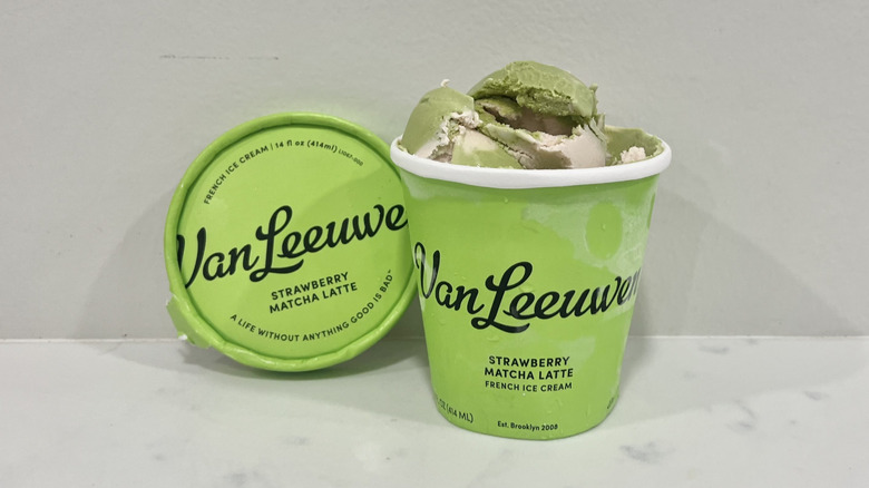 Opened Van Leeuwen strawberry matcha latte ice cream pint on a countertop