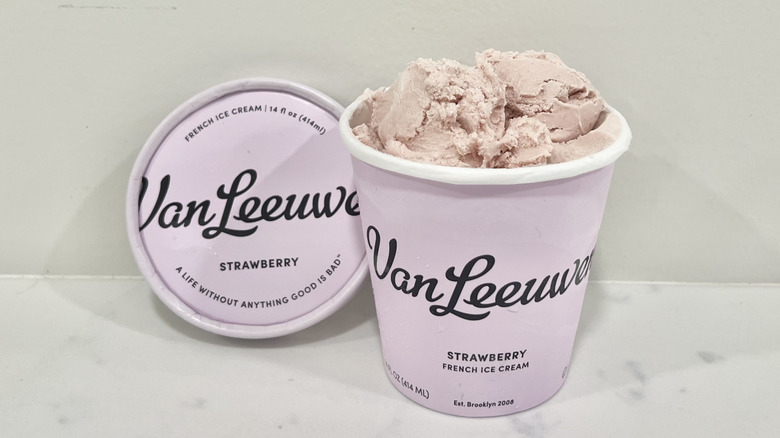 Opened Van Leeuwen strawberry ice cream pint on a countertop