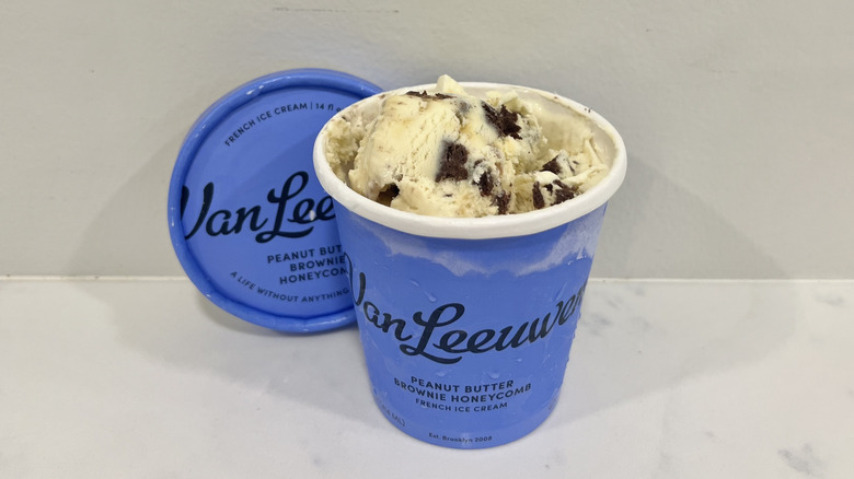 Opened Van Leeuwen peanut butter brownie honeycomb ice cream pint on a countertop