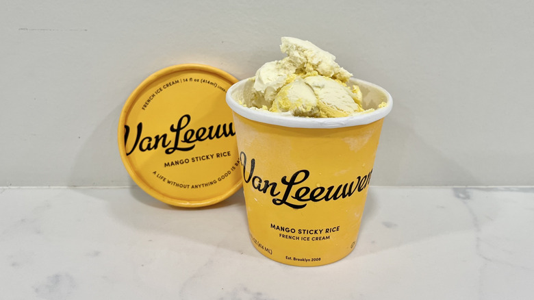 Opened Van Leeuwen mango sticky rice ice cream pint on a countertop