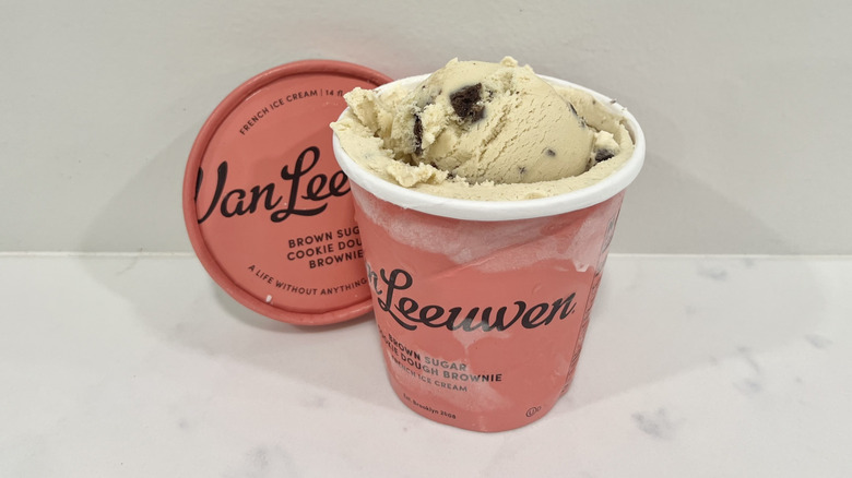 Opened Van Leeuwen brown sugar cookie dough brownie ice cream pint on a countertop