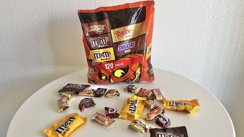 Twix Snickers M&Ms candy variety pack on a table