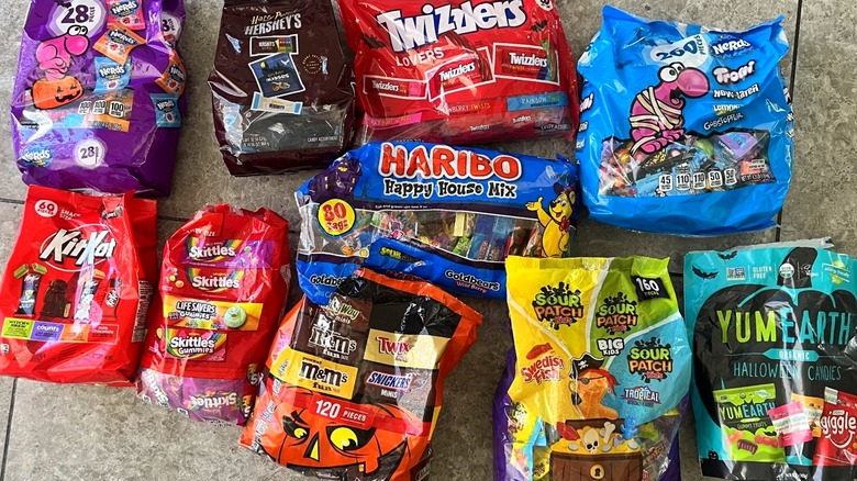 Variety packs of candy with tile background