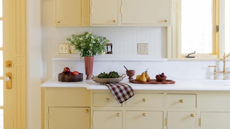 kitchen with butter yellow cabinetry