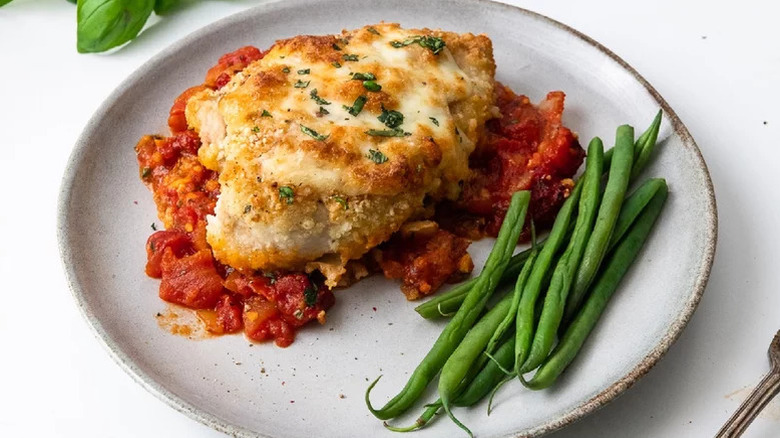 Crispy And Saucy Chicken Parmesan with green beans