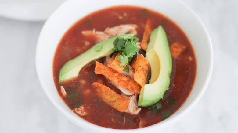 Top view of bowl of Easy Slow Cooker Chicken Tortilla Soup