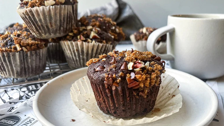 Espresso Chocolate Muffin on white plate with cup of coffee