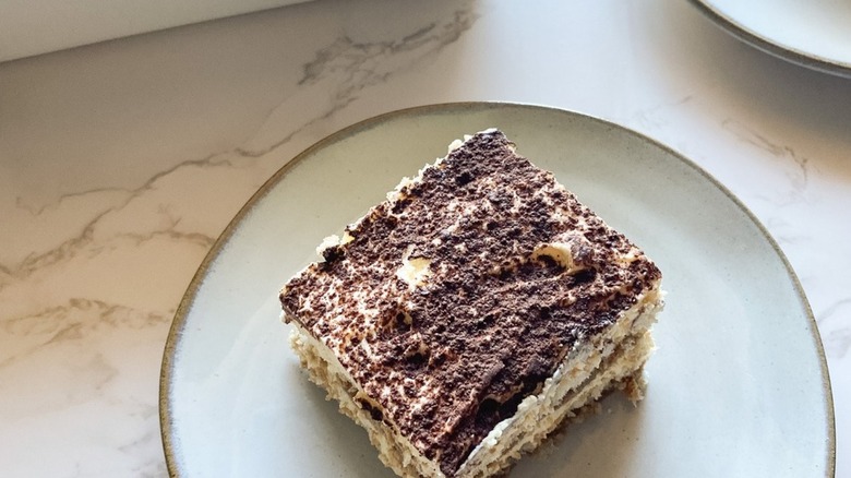 Tiramisu on white plate