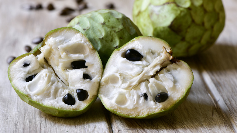 Close up of cherimoya sliced open