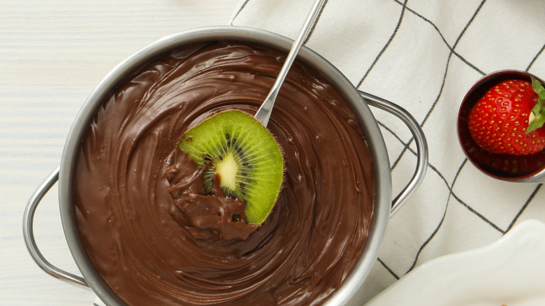 Kiwi sliced dipped into dark chocolate