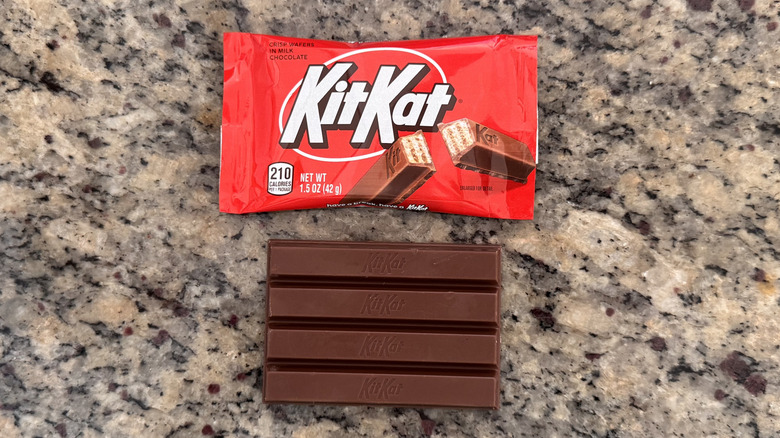 kit kat on counter with wrapper beside it