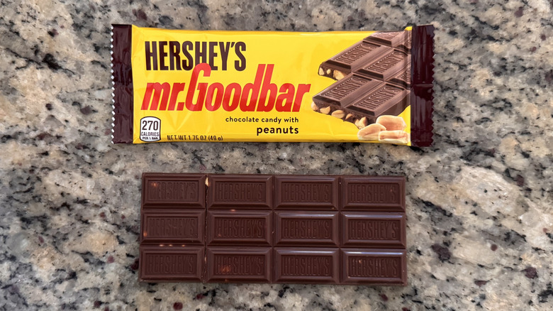 Mr. Goodbar candy bar on counter beside wrapper